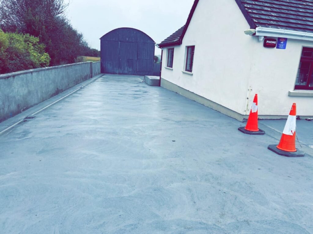 Excavator performing ground works and site preparation in Galway