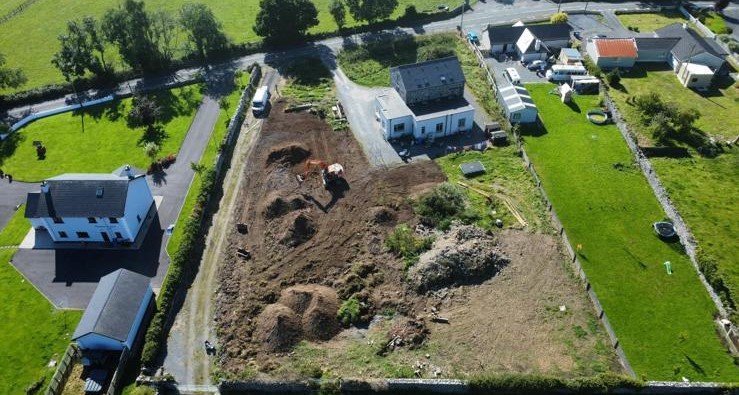 Excavator preparing site for ground works in Galway