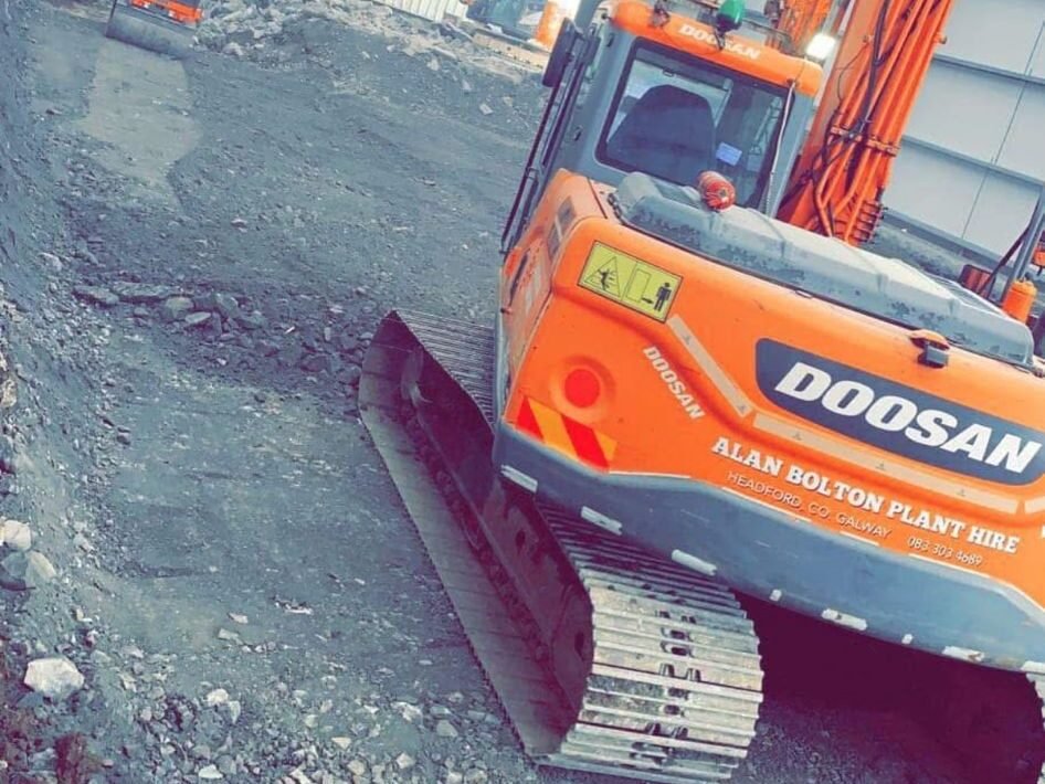 Excavator preparing site for ground works in Galway

